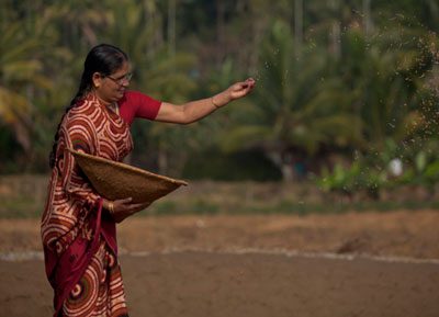 woman scattering seeds