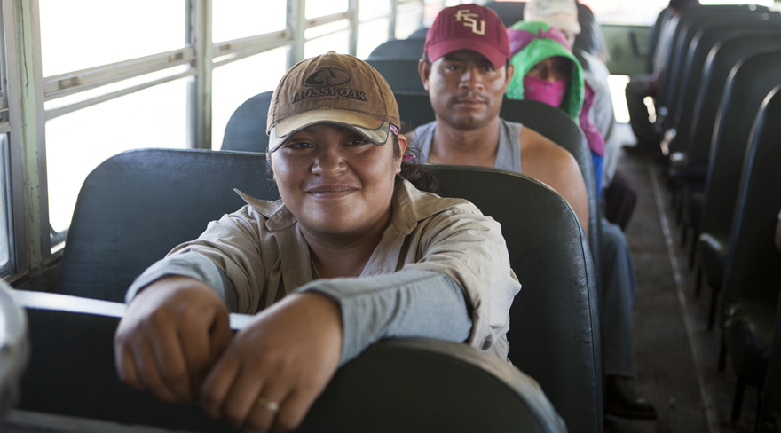 Immokalee Farm Workers waiting on bus